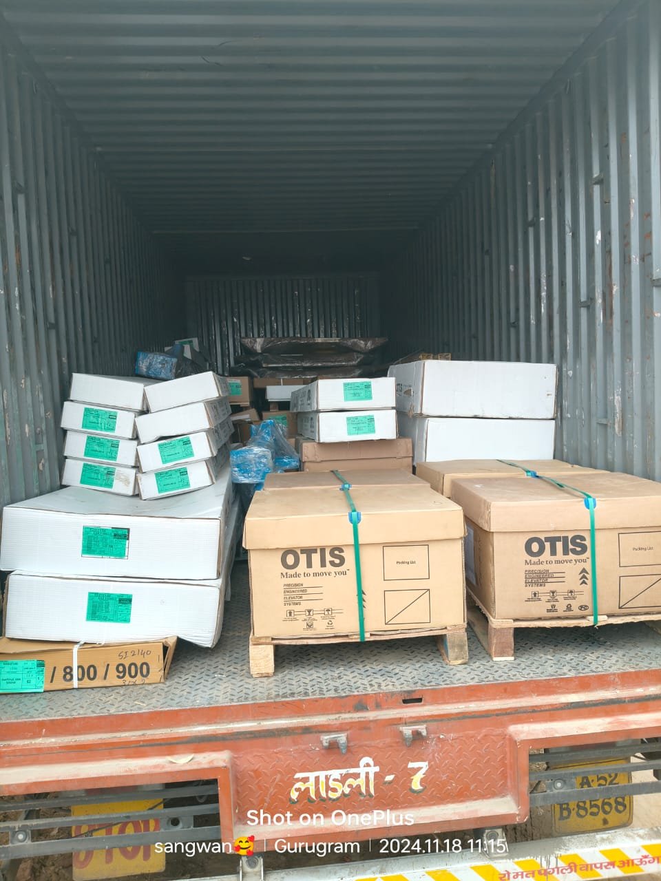 Palletised commercial cargo strapped and loaded for office and industrial relocation